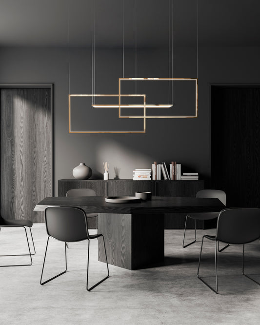 Lámpara colgante moderna rectangular dorada en comedor minimalista de tonos oscuros