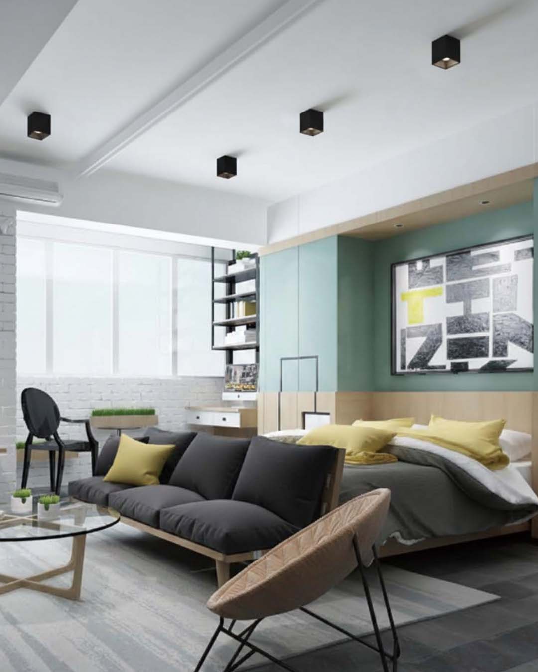 Sala moderna con focos de techo negros, sofá gris y decoración minimalista luminosa