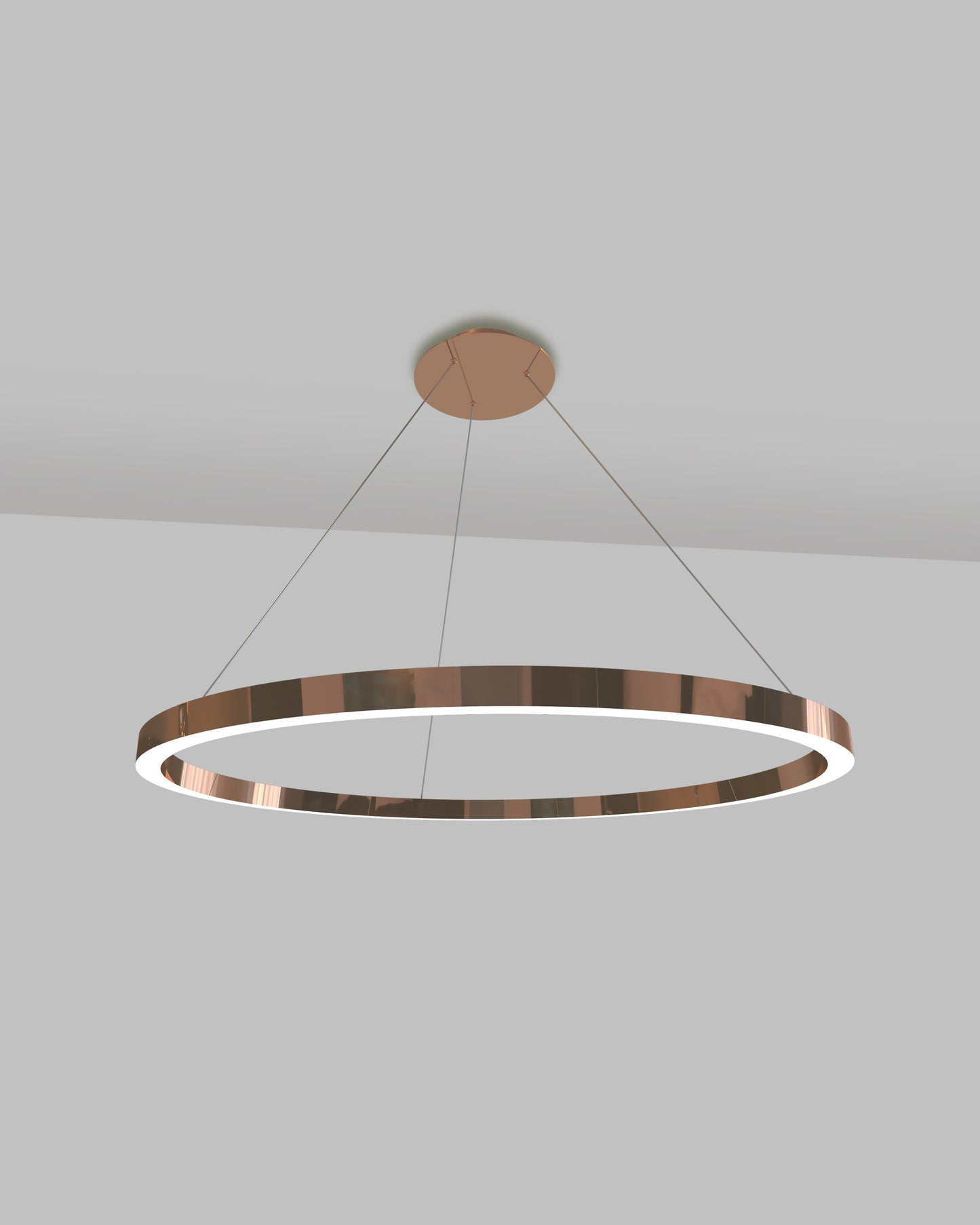 Lámpara colgante moderna de aro circular en color cobre para iluminación interior.