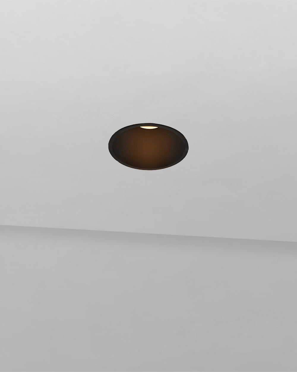 Luminaria empotrable de techo negra, diseño minimalista para iluminación interior.