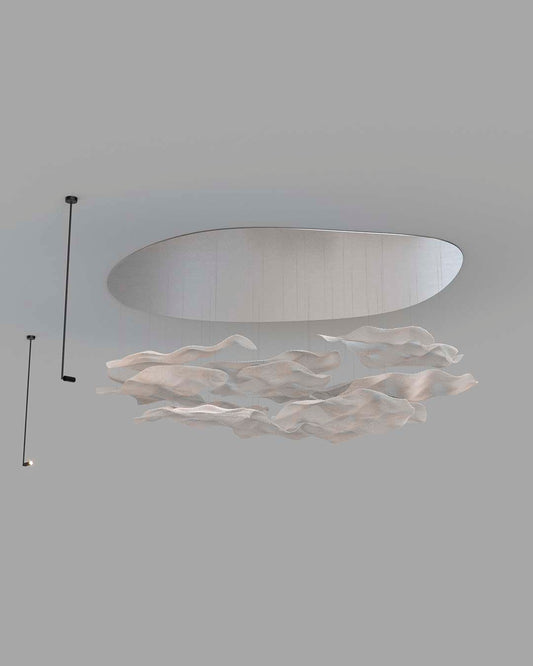 Lámpara de techo moderna con formas onduladas blancas en ambiente minimalista