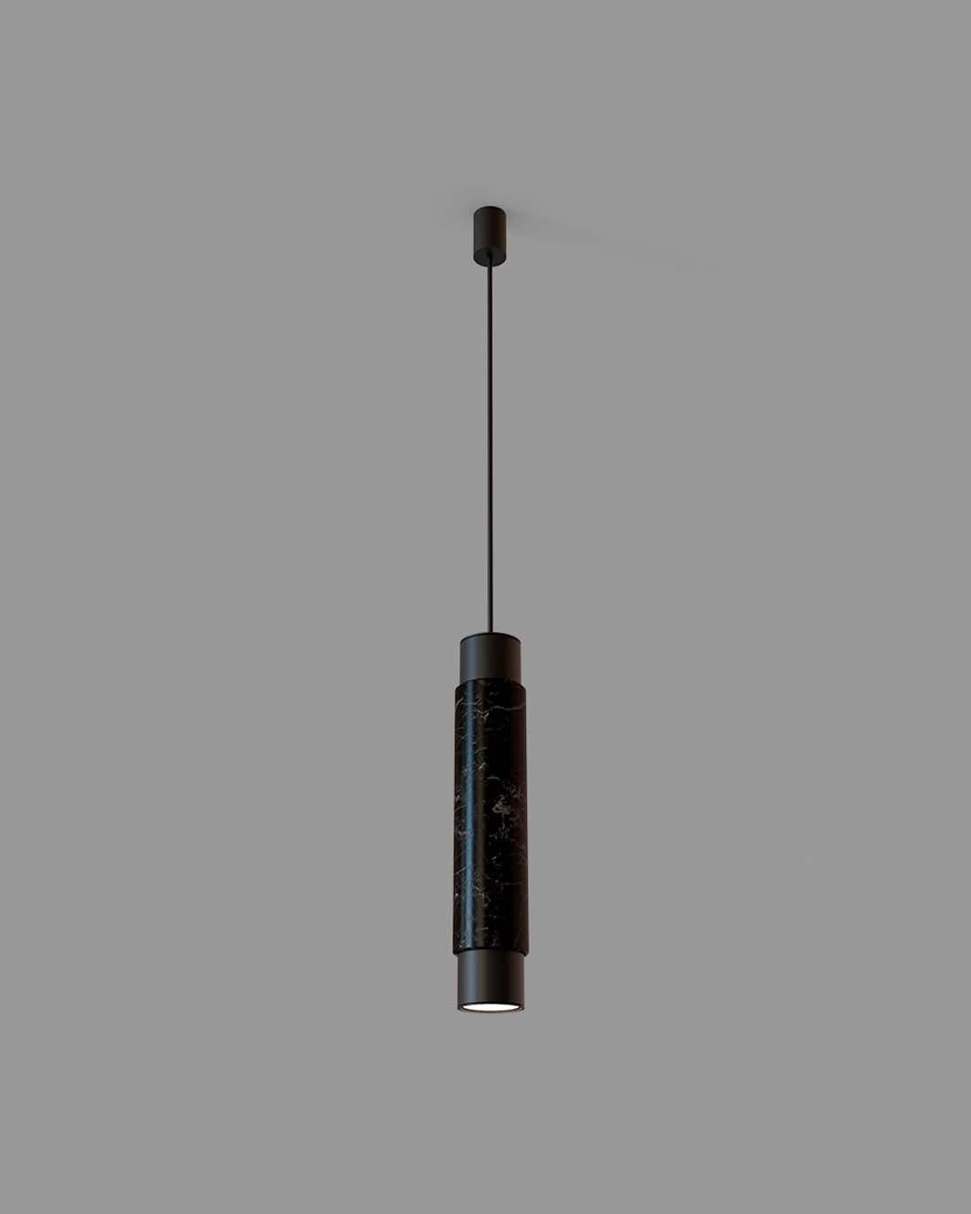 Lámpara colgante cilíndrica de mármol negro, diseño moderno, fondo gris