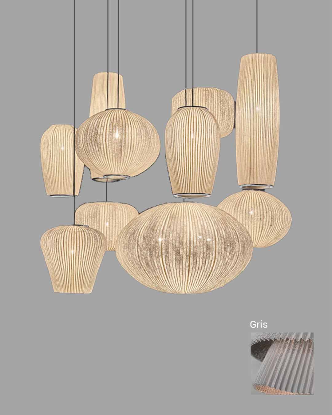 Lámparas colgantes de techo modernas en color gris, diseño texturizado y luz cálida.
