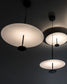 Lámparas colgantes modernas de disco blanco iluminadas, diseño contemporáneo, Birot MX boutique de iluminación.