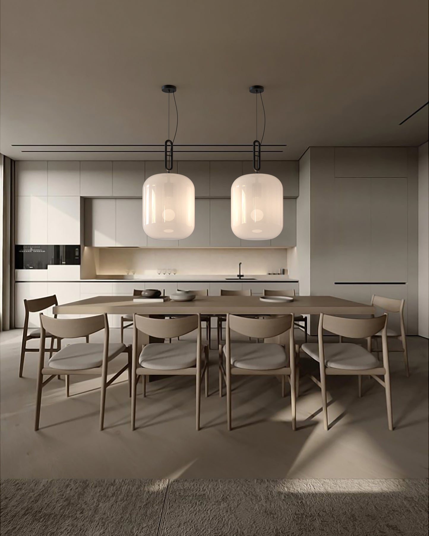 Lámparas colgantes modernas sobre mesa de madera en cocina minimalista, iluminación Birot MX