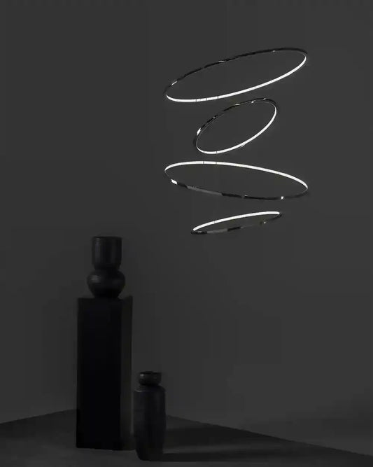 Lámpara colgante moderna de aros luminosos en ambiente minimalista, Birot MX iluminación.