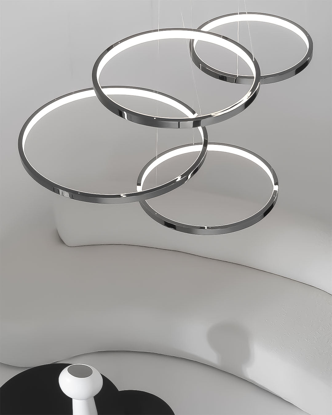 Lámpara colgante de aros LED modernos sobre sala minimalista en tonos claros