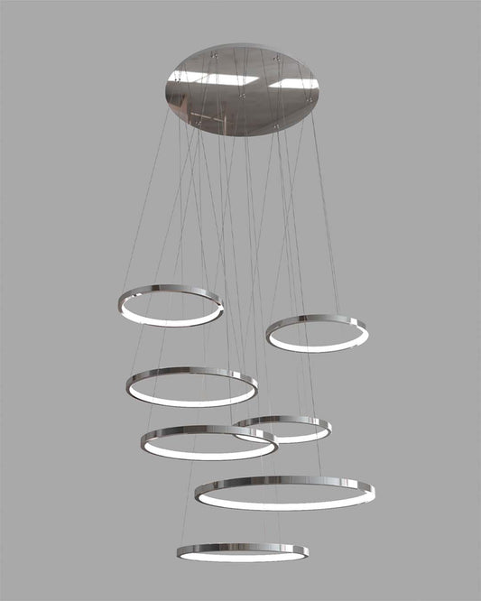 Lámpara colgante moderna de aros LED, acabado plateado, diseño minimalista, iluminación decorativa.