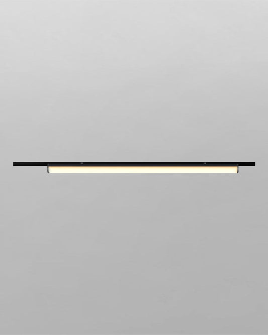 Lámpara lineal moderna negra encendida sobre fondo gris, boutique de iluminación Birot MX