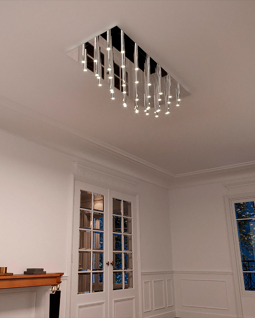 Lámpara de techo rectangular moderna con colgantes LED en sala elegante, iluminación decorativa.