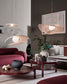 Sala moderna con lámparas colgantes de diseño, muebles burdeos y decoración elegante de Birot MX.
