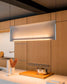 Lámpara colgante moderna iluminando cocina minimalista con muebles de madera, Birot MX