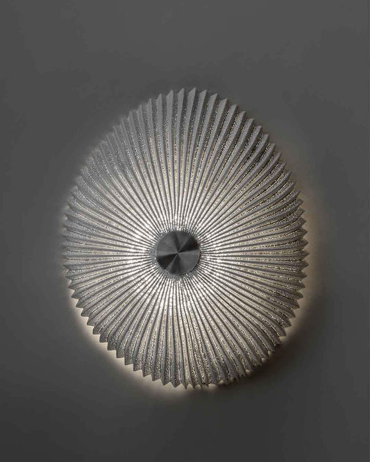 Lámpara de pared circular texturizada con luz LED decorativa, Birot MX iluminación.