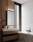 Baño moderno con lavabo de madera, iluminación LED, pared de mármol y tina contemporánea.