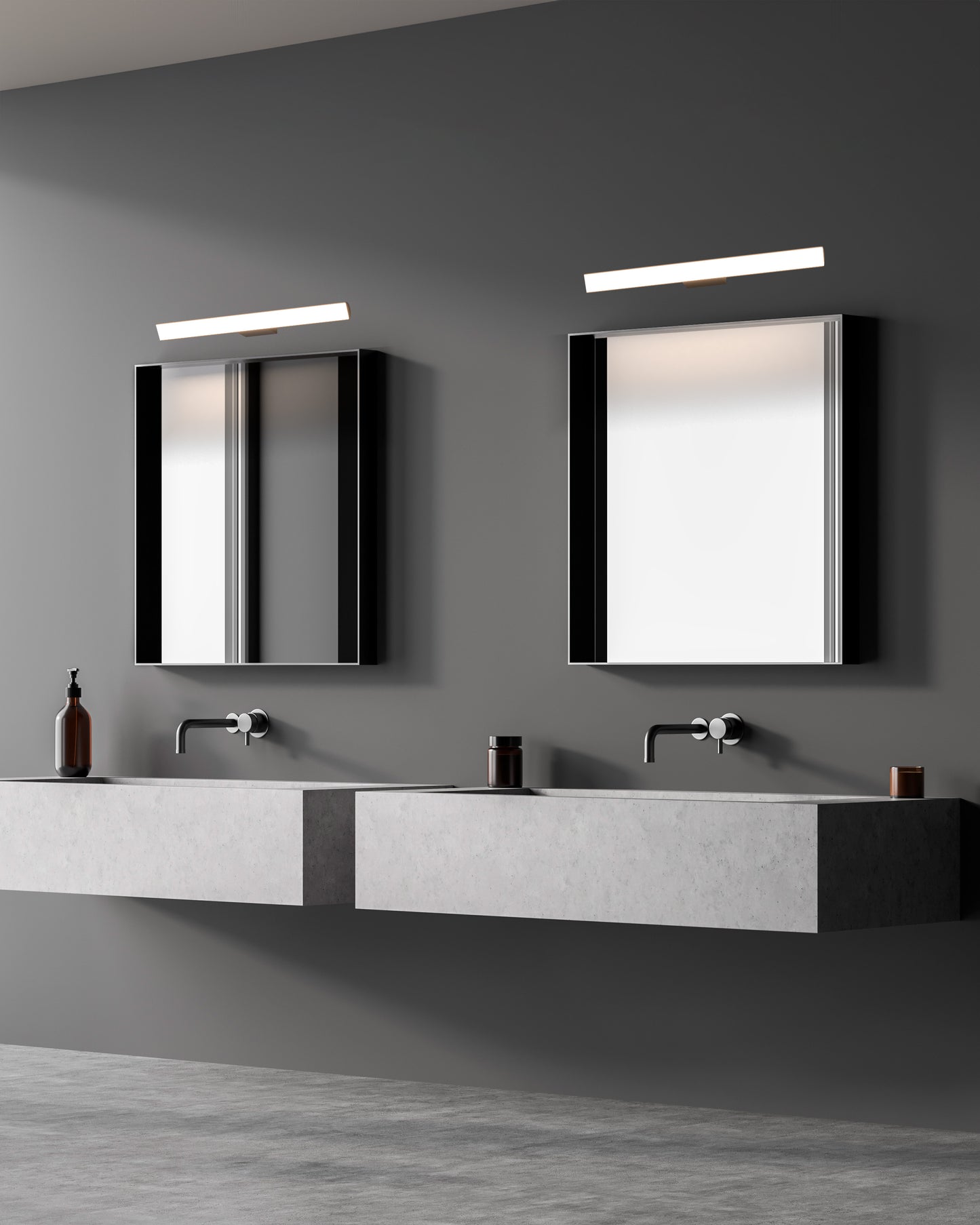 Baño moderno con dos espejos, lavabos flotantes y lámparas LED de pared.