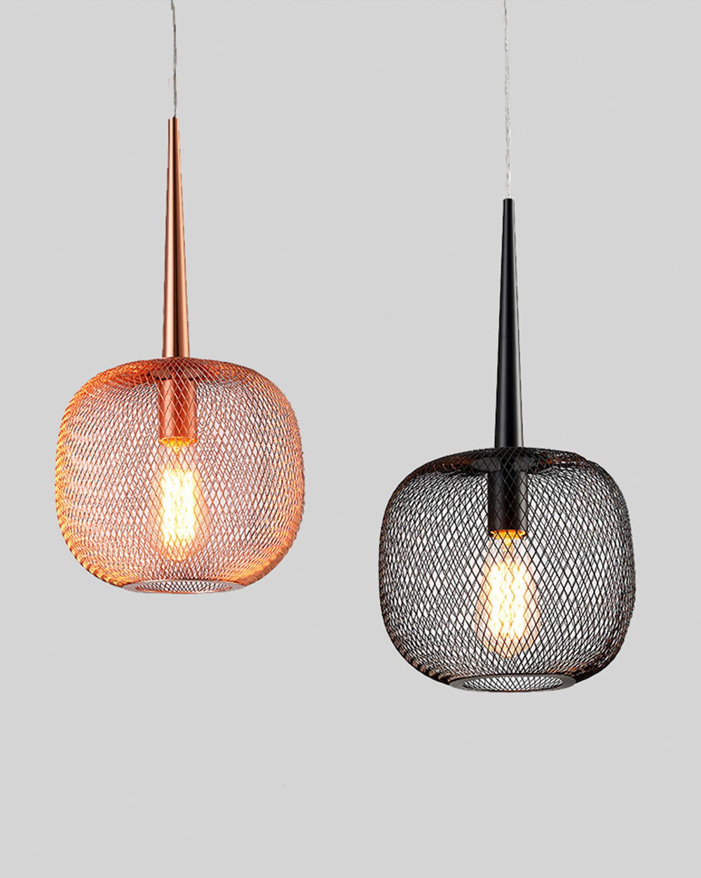 Lámparas colgantes modernas de malla metálica en color cobre y negro, encendidas