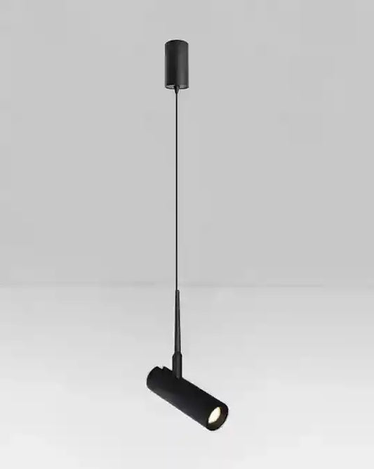 Lámpara colgante negra tipo spot cilíndrico moderno sobre fondo gris, Birot MX iluminación.