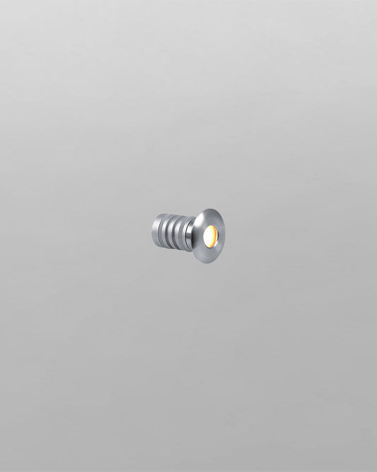 Luz LED empotrable redonda metálica, diseño moderno, fondo gris claro
