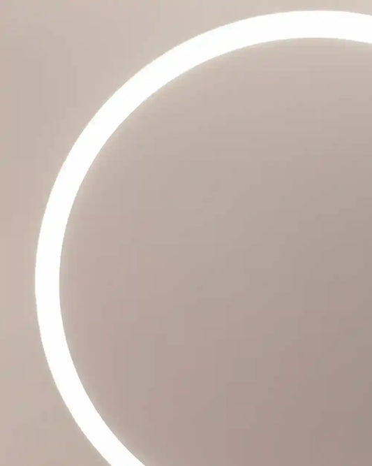 Aro de luz LED circular moderno sobre fondo beige, iluminación decorativa Birot MX