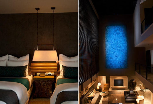 Habitación de hotel con iluminación cálida y sala moderna con luz decorativa azul
