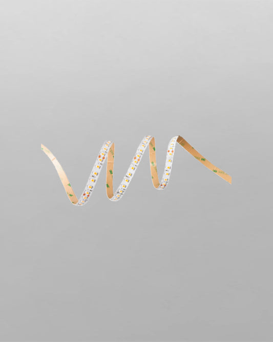 Tira LED flexible para iluminación decorativa, fondo gris, vista enrollada